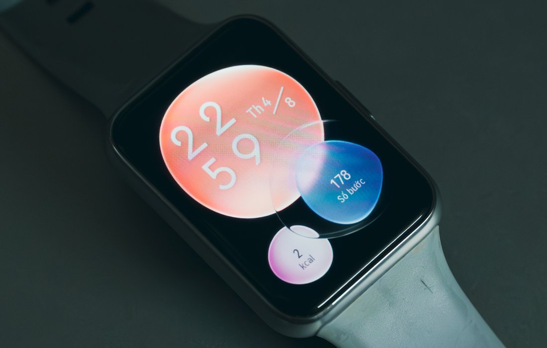 AMOLED smartwatch display with health tracking widgets