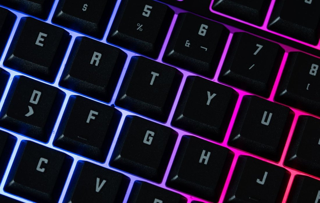 Close up of RGB backlit gaming mechanical keyboard keys
