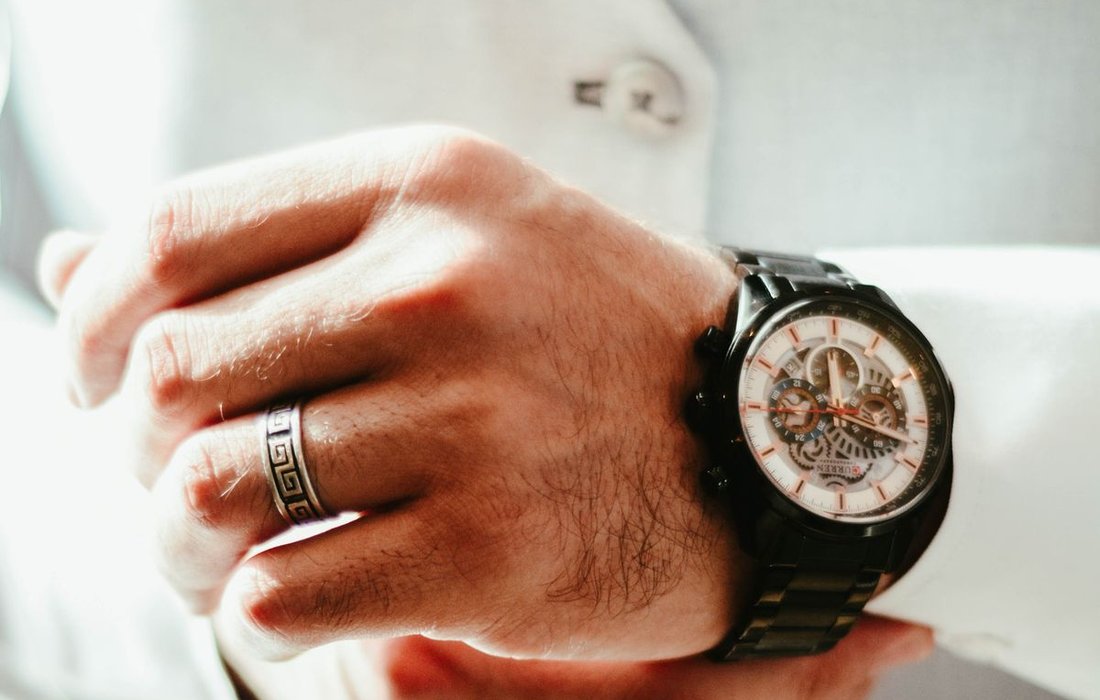 Analog look watch worn with formal wear